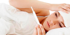 Fiebre Termometro Mujer cama Calentura